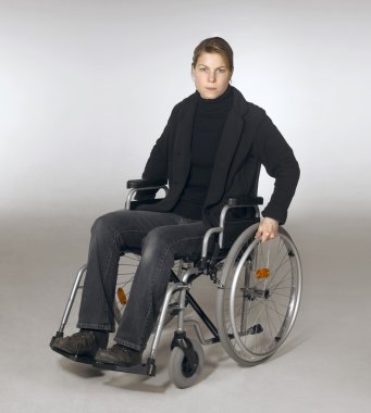 Woman in a wheelchair clipart