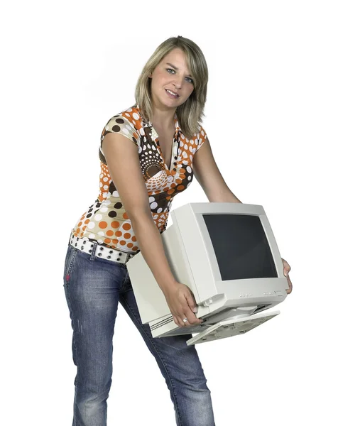 stock image Cute girl carrying a computer monitor