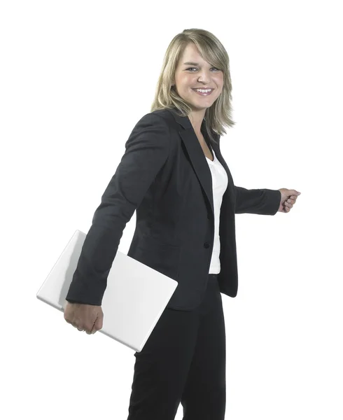 Young business woman holding a laptop — Stock Photo, Image