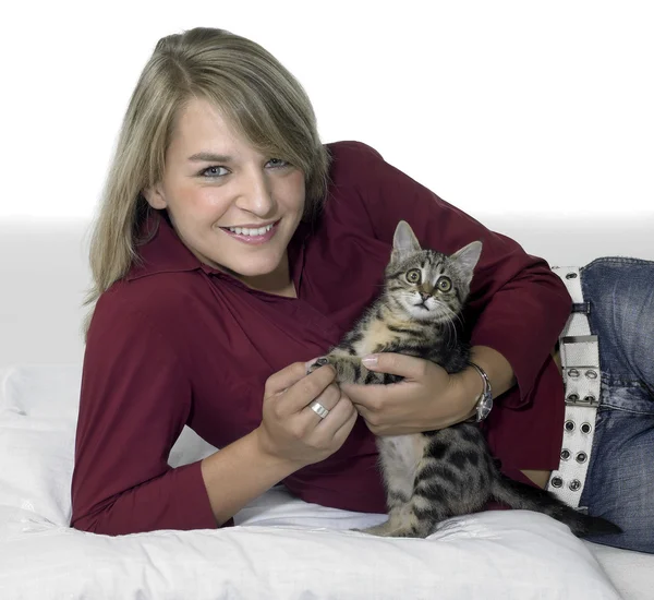 stock image Smiling blond girl and kitten