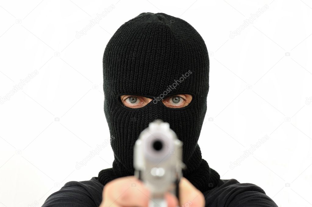 masked man with rifle