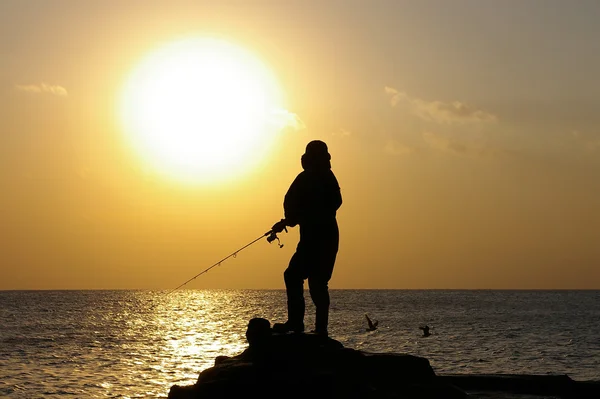 stock image Fisherman in the sunset