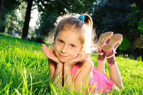 Little girl on grass — Stock Photo, Image