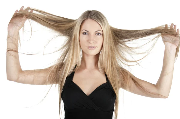 Mulher segurando cabelos longos — Fotografia de Stock