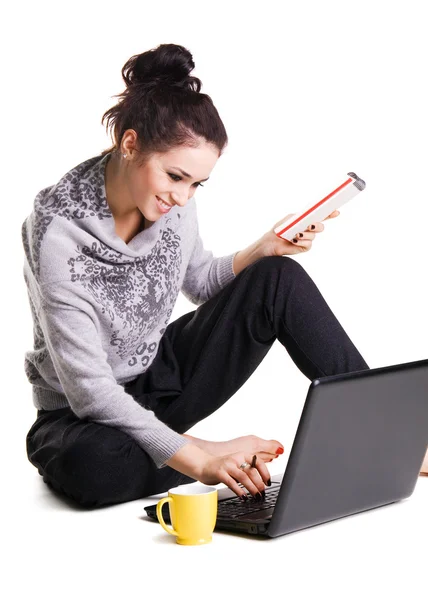 Lovely cheerful girl is surfing with laptop — Stock Photo, Image