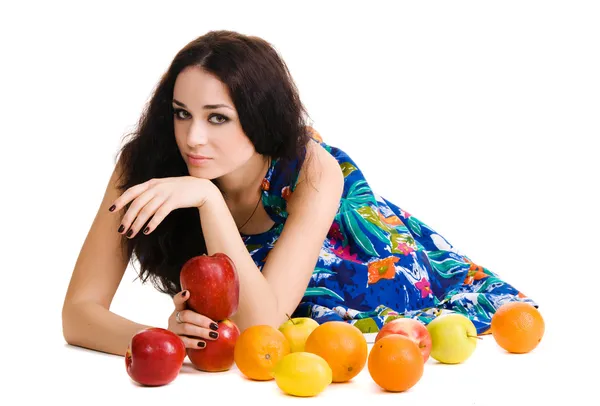 Young beautiful brunette with fresh fruits — Stock Photo, Image