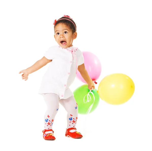Hübsches ausdrucksstarkes kleines Mädchen mit bunten Luftballons — Stockfoto