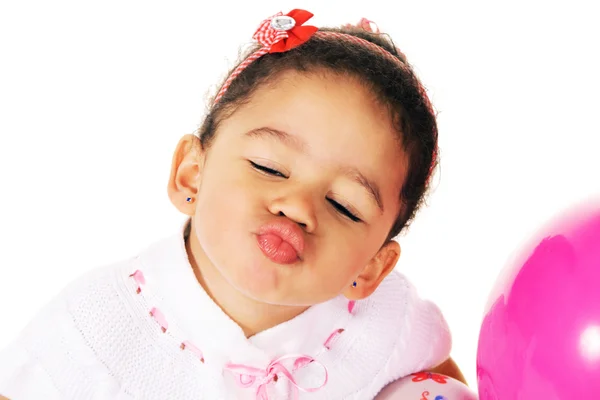 Funny little girl giving a kiss — Stock Photo, Image