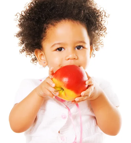 Pretty little girl holding an apple — Stock Photo, Image