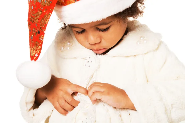 Schattige baby in kerst hoed en bont — Stockfoto