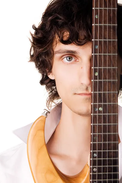 Close-up portrait of a young man with electric guitar — Stock Photo, Image