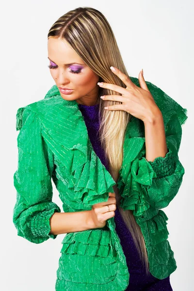 Pretty woman in a green jacket — Stock Photo, Image