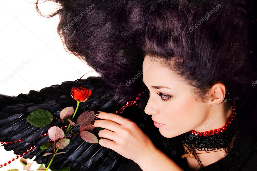 Black angel with a scarlet rose