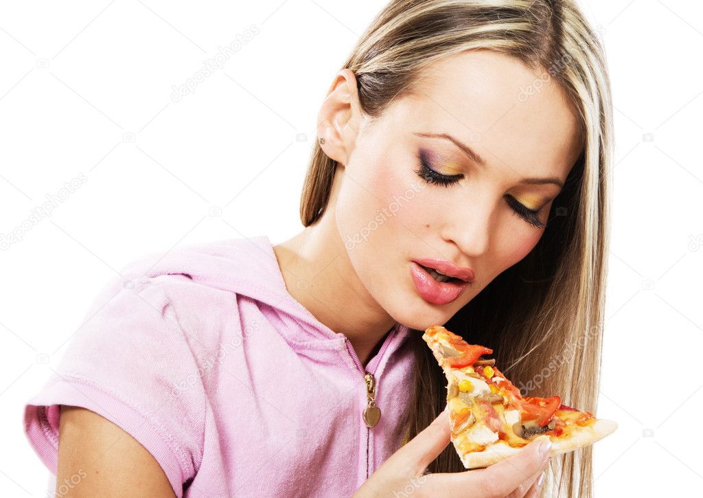 Lovely young woman eating pizza