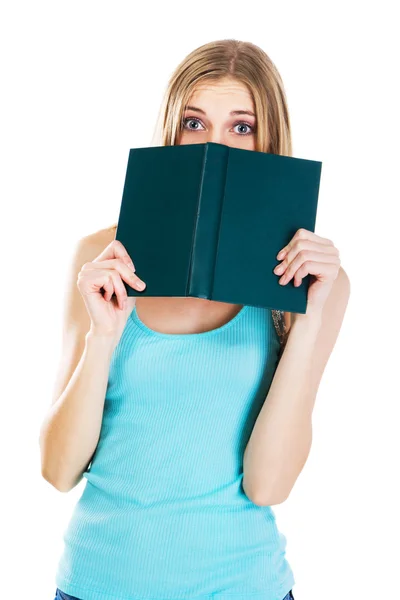 Испуганная девушка с книгой — стоковое фото
