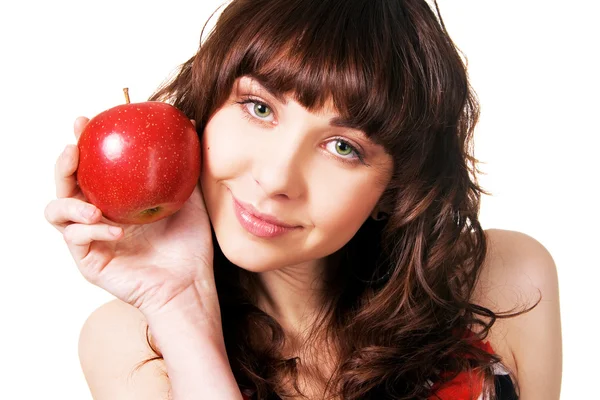 एक परिपक्व लाल सेब के साथ सुंदर ब्रुनेट — स्टॉक फ़ोटो, इमेज