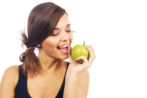 Belle fille mordant une pomme — Photo