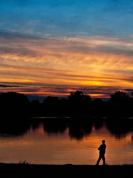 Rybář při západu slunce — Stock fotografie