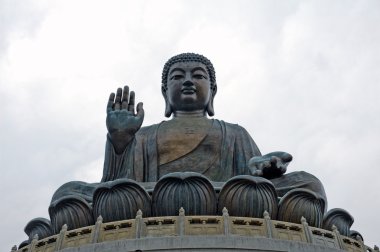 Statues In Front Of Buddha In Hong Kong clipart