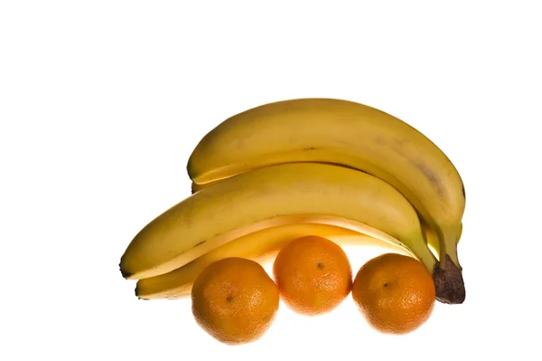 Ripe bananas and oranges — Stock Photo, Image