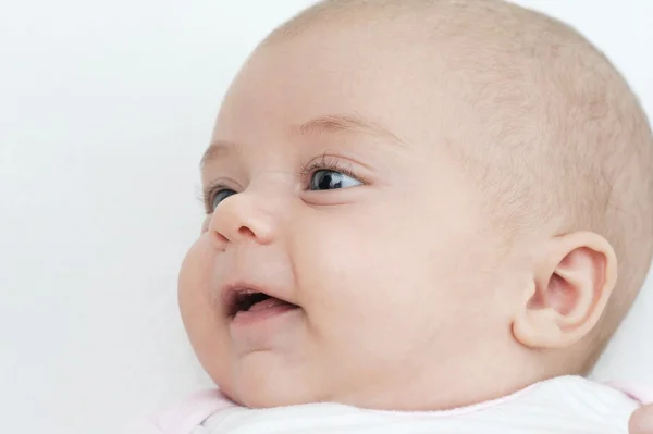 Glimlachende baby — Stockfoto