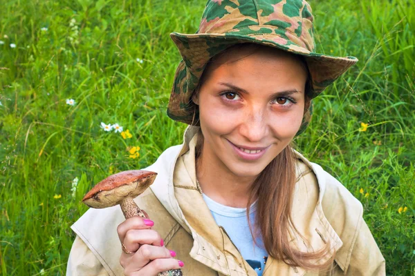 The girl with the mushroom. — Stock Photo, Image