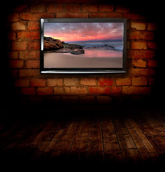 Плазменные телевизоры на стене — стоковое фото