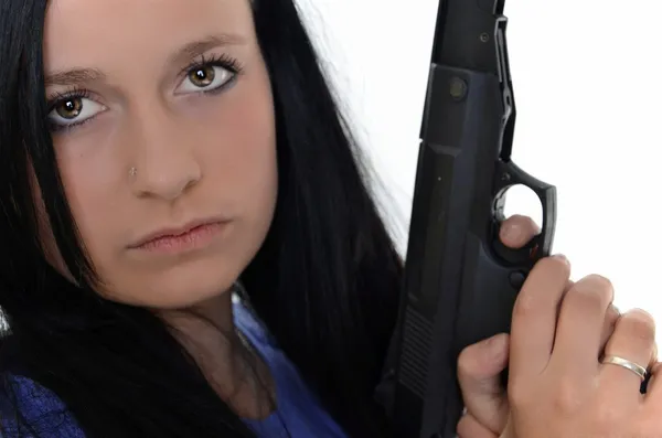Mulher com uma arma isolada em um fundo branco — Fotografia de Stock