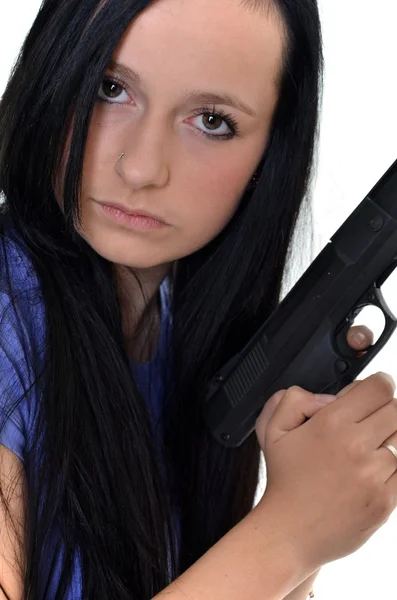 Женщина с пистолетом на белом фоне — стоковое фото