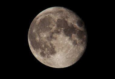 Full moon closeup showing the details of the lunar surface. clipart