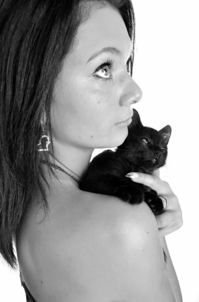 Женщина с черной кошкой — стоковое фото