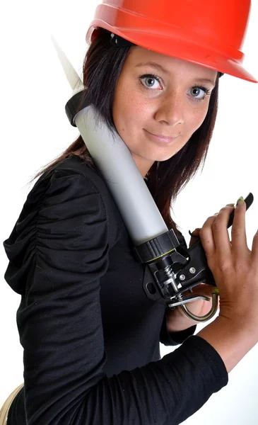 Donna con pistola calafataggio — Foto Stock