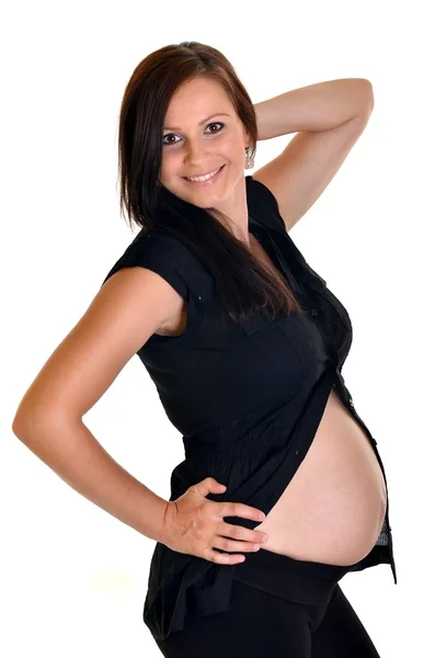 Zwanger vrouw strelen haar buik over witte achtergrond — Stockfoto