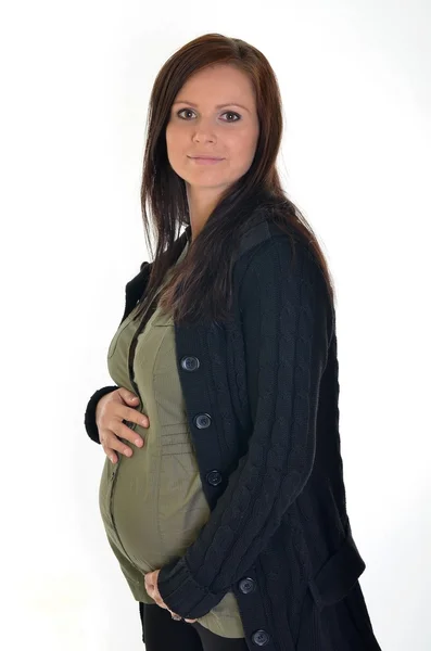 Schwangere streichelt ihren Bauch über weißem Hintergrund — Stockfoto
