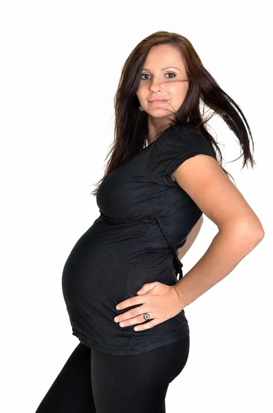 Mulher grávida acariciando sua barriga sobre fundo branco — Fotografia de Stock