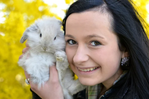 Beautiful girl with rabbit — Stock Photo, Image