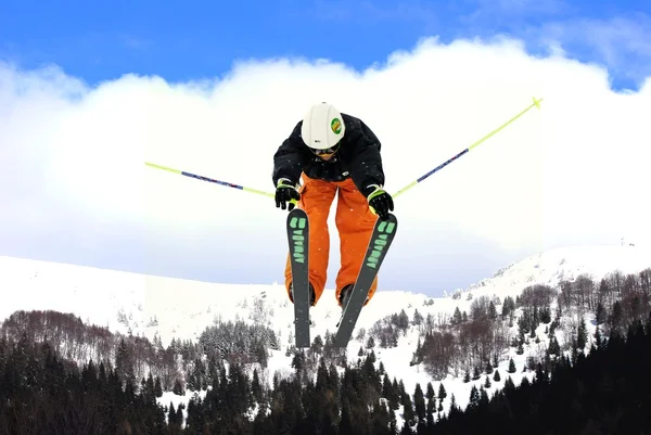 Flying freeskier on mountains — Stock Photo, Image