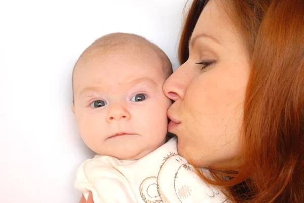 Foto van gelukkig moeder met baby over wit — Stockfoto