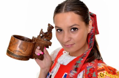 Traditional slovakian woman with dippers clipart