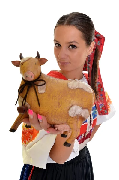 Woman with ceramic cow — Stock Photo, Image