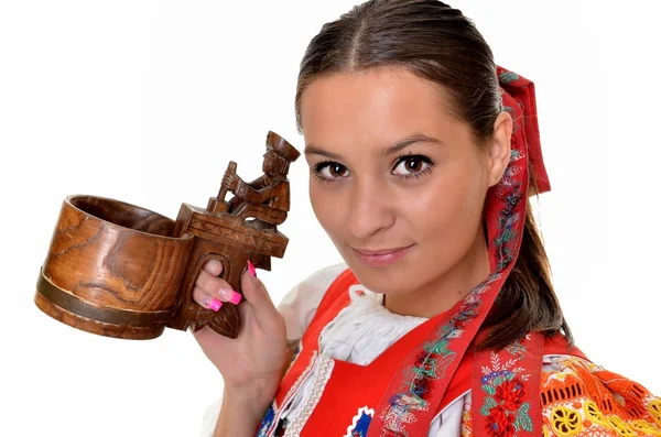 Traditional slovakian woman with dippers — Stock Photo, Image