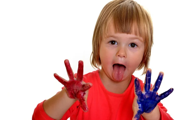 Little girl with paint over white background — Stock Photo, Image