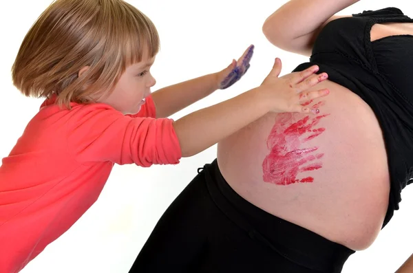 Baby schilderij zwangere vrouw — Stockfoto
