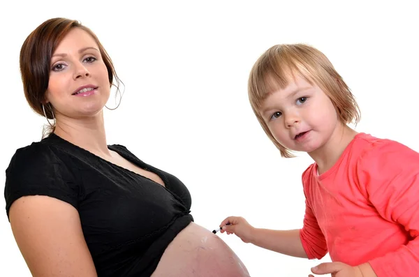 Baby painting pregnant woman — Stock Photo, Image