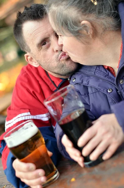 Down syndrome couple drinking — Stock Photo, Image