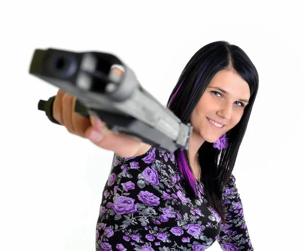 Donna con una pistola isolata su sfondo bianco — Foto Stock