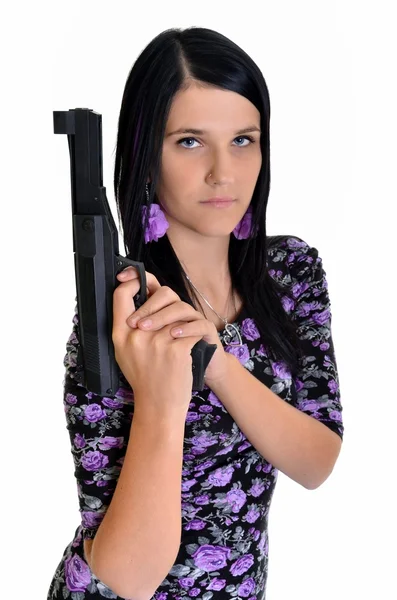 Vrouw met een pistool geïsoleerd op een witte achtergrond — Stockfoto