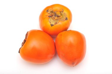 Ripe persimmon isolated on white