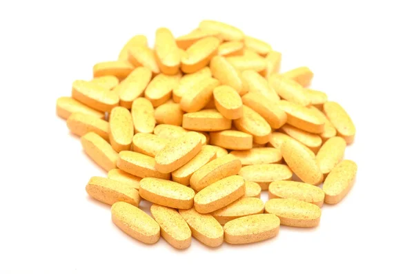 Bunch of capsules on white background — Stok fotoğraf