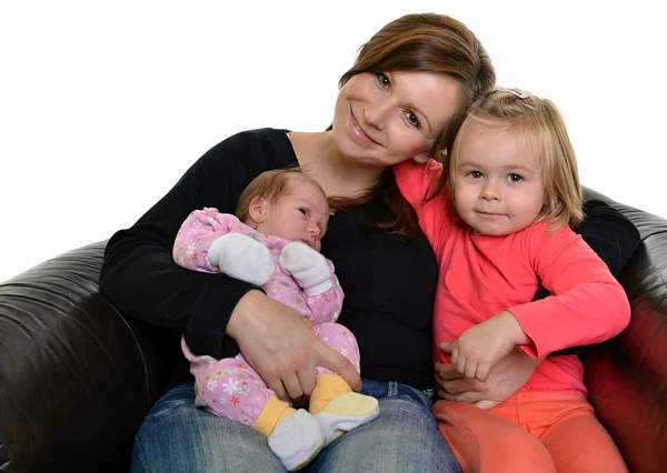 Foto van gelukkig moeder met haar dochters over Wit — Stockfoto